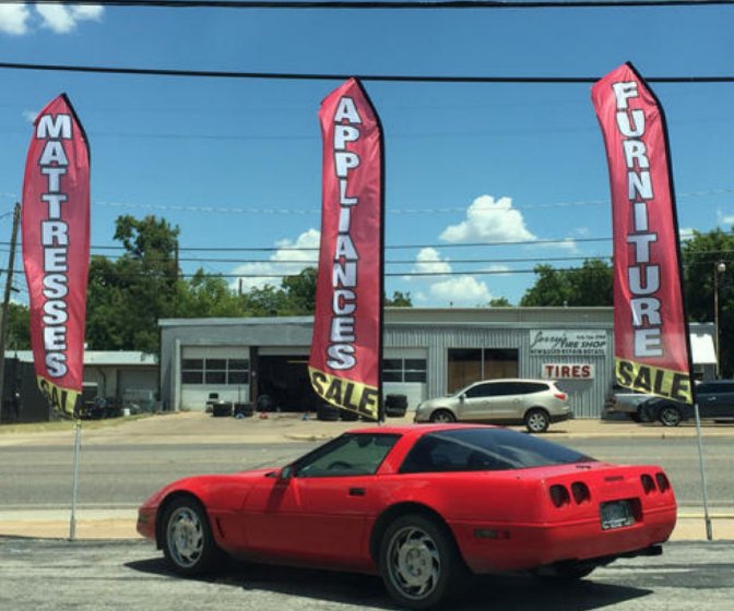 Custom designed 16 ft. Flags with stakes, printed on both sides, washable UV material from Go Forth Banners. 